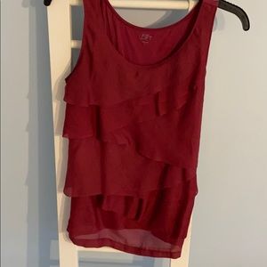 Cute layered front top. Cranberry colored.